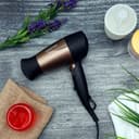 استشوار شعر صغير 1600 واط مع مقبض قابل للطي مع إعدادين للحرارة والسرعة جيباس Geepas Speed & 2 Temperature Foldable Handle 1600W Mini Hair Dryer