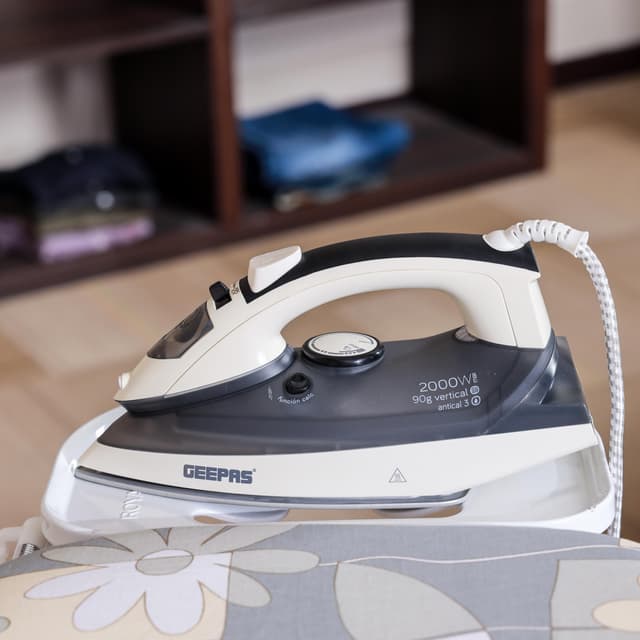 Geepas GSI7788 Ceramic Steam Iron 2400W - Temperature Control for Wet/Dry Crease Free Ironing - Steam Function & Self Cleaning Function - 2 Years Warranty